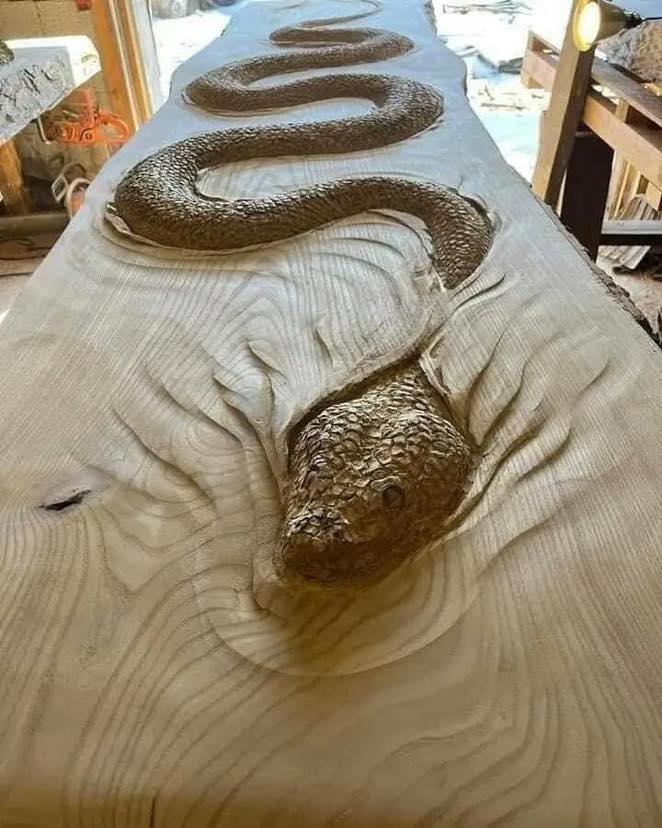 Wood carvings by master woodcarver Scott Dow in incredible detail